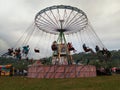 People having fun in a chains carousel