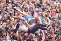 People having fun at a concert on the 23rd Woodstock Festival Poland.