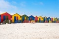 Colorful beach huts, St. James, South Africa. Beautiful white sand on wide beach. Royalty Free Stock Photo