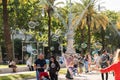 People Having Fun And Making Soap Bubbles For Children Near The Arc de Triomf Triumphal Arc Or Arco de Triunfo