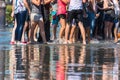 People having fun in a mirror fountain in Bordeaux, France Royalty Free Stock Photo