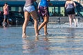 People having fun in a mirror fountain in Bordeaux, France Royalty Free Stock Photo