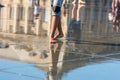 People having fun in a mirror fountain in Bordeaux, France Royalty Free Stock Photo