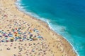 Crowded ocean beach. Nazare, Portugal