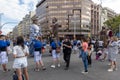 People having fun at the parade of the Merce festival in Barcelona, with giants