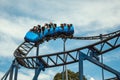 People having fun on a roller coaster