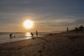 People at Echo Beach in Canggu Bali indonesia at sunset