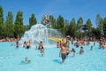 People having fun in the swimming pool in water park