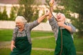 People having fun, water hose. Royalty Free Stock Photo