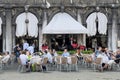 People having lunch outdoor at restaurant. Live music band. Royalty Free Stock Photo