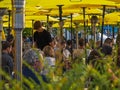 People is having lunch in a terrace restaurant, relaxing moment, style of life. Street Bar beer restaurant outdoor Royalty Free Stock Photo