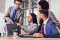 People having meeting around table in modern office Royalty Free Stock Photo