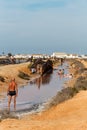 People having a mud bath in Los Barros.