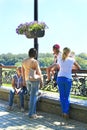 People having a rest in city park. Women relaxing in city park in vacations