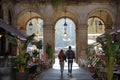 People Heading Towards Royal Square Placa Reial or Plaza Real a Well-Known Tourist Attraction Of Barcelona.