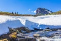 People hikers and mountain at Hydnefossen waterfall river Hemsedal Norway