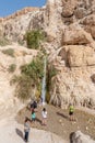 People hiking in beautiful scenic Ein Gedi National Park in southern Israel
