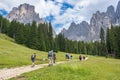 People hiking in the Dolomites Alps