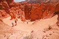 People hiking on the Navajo Loop Train in Bryce Canyon National Park, Utah, USA. This part of hike is called Wall Street, great