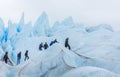 People hiking at Perito Moreno Glacier in the Los Glaciares National Park, Santa Cruz Province, Patagonia Argentina. Royalty Free Stock Photo