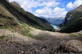 People hiking on the Plain of the Six Glaciers hiking trail near Lake Louise Royalty Free Stock Photo