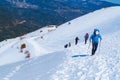 People hiking in the snow at Vardousia mountains in Central Greece- E4 path Royalty Free Stock Photo