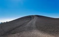 People hiking to the top of Inferno Cone at Craters of the Moon National Park Royalty Free Stock Photo