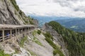 People at hiking trail through Austrian mountains to ice cave Royalty Free Stock Photo