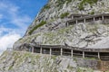 People at hiking trail through Austrian mountains to ice cave Royalty Free Stock Photo