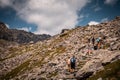 People hiking on a trail in High Tatras