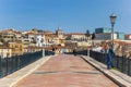 People on the historic bridge of Zamora