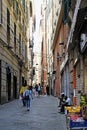 People on Historic Narrow Pedestrian Street Via di Pre, Genoa, Italy.