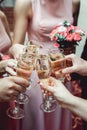 People hold in hands glasses with white wine. wedding party. Royalty Free Stock Photo