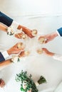 People hold in hands glasses with white wine. wedding party. Royalty Free Stock Photo