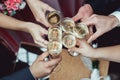People hold in hands glasses with white wine. wedding party. Royalty Free Stock Photo