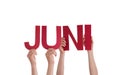 People Hold Straight German Word Juni Means June Royalty Free Stock Photo