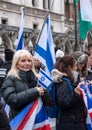 People holding banners and flags at the March Against Antisemitism, in central London UK during the Israel Gaza conflict.