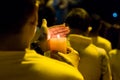 People holding candle vigil in darkness seeking hope, worship, p Royalty Free Stock Photo