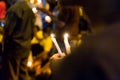 People holding candle vigil in darkness seeking hope, worship, p Royalty Free Stock Photo