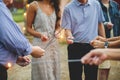 People holding fire-sticks together and burning bengal fires Royalty Free Stock Photo