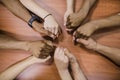 people holding hands table. High quality photo