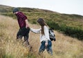 People Holding Hands Walking Mountain Togetherness Hiking Concept