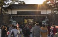 People holding Japanese flags on their way to the appearance on the occasion of the New Year of Their Majesties the Emperor and Em Royalty Free Stock Photo