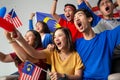 People holding malaysia flag celebrating independence day