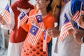People holding malaysia flag celebrating independence day Royalty Free Stock Photo