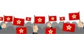 People holding the national flag in hand , vector banner illustration / Hong kong