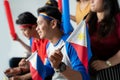 People holding philippines flag celebrating independence day