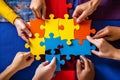 People holding puzzle pieces together Royalty Free Stock Photo