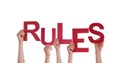 People Holding Rules