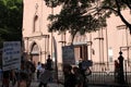 People on city street outside church in New York City USA